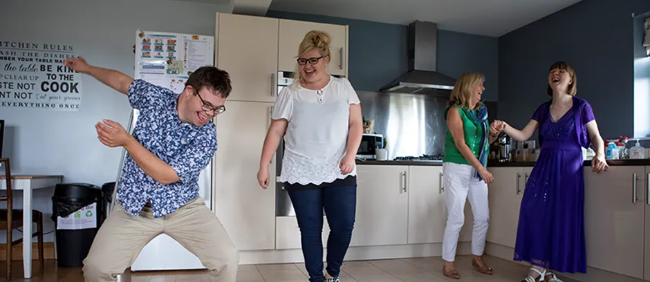 A group of adults enjoying a social activity together in a community setting